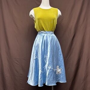 Blue satin midi skirt with felted poodle
